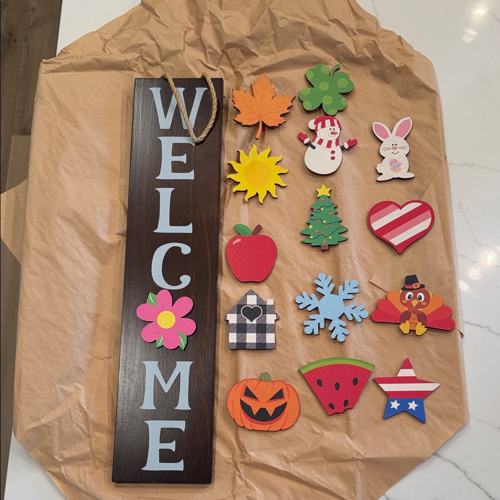 Cute Welcome Sign with interchangeable holiday magnets.